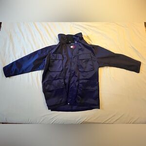 Tommy Hilfiger 90s Men's Navy Blue Jacket with Multiple Pockets, size L
